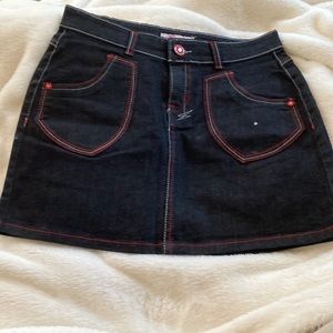 Mini skirt, blue Jean material, brand new, never worn. Really cute.